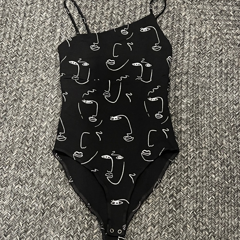 Line art faces bodysuit